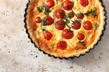 French quiches pie with tomatoes  ,cheese and salmon 