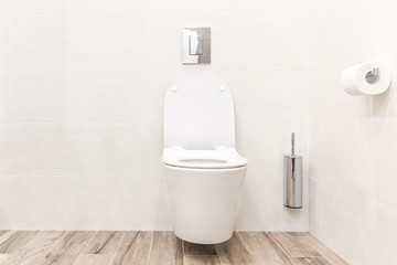 Toilet bowl in modern white style bathroom