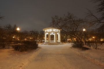 Old arbor in the Moscow Gorky park, which is brightly lit