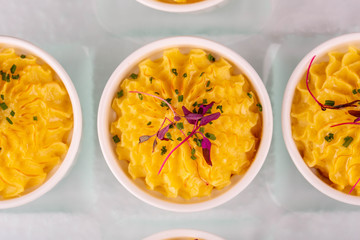 Potatoes puree, is served with greens