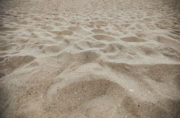 Fine beach sand in the summer sun