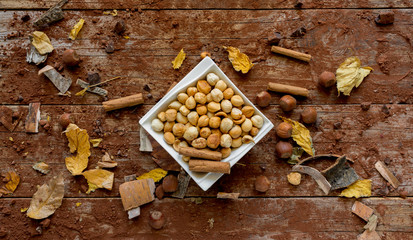 top view of  shelled hazelnuts on wood