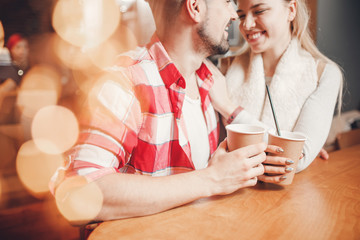 Romantic couple dating in cafe, drink