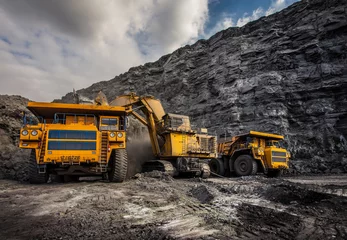 Fotobehang Vrachtwagen coal dumpers in a coal mine for coal loading  © Евгений Мирошниченко