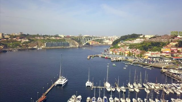 Yacht parking. Yacht and sailboat is moored at the quay, Aerial view of sailing yachts and boats near wooden piers.