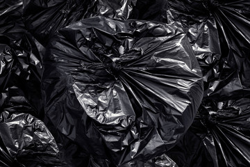 garbage plastic bag black, many bag plastic stack of garbage waste, plastic bag for waste separation recycle, pile of garbage waste plastic, bag black color is bin for garbage