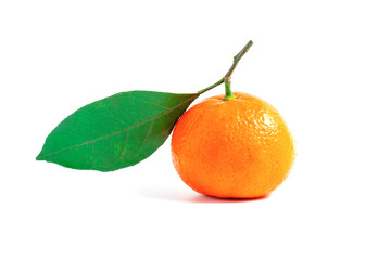 Tangerine or clementine with green leaf isolated on white background