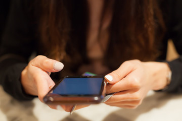 Woman pays for online shopping by credit card, smart phone digital wireless internet technology. Modern Trend, Lifestyle, Business Transaction, Communication, Artificial Society and Mobile App concept