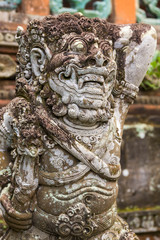 Balinese stone statue in a temple