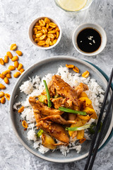 Kung Pao chicken, stir-fried Chinese sichuan traditional sichuan  dish with chicken, peanuts, vegetables and chili peppers.