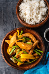 Kung Pao chicken, stir-fried Chinese sichuan traditional sichuan  dish with chicken, peanuts, vegetables and chili peppers.
