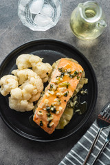 Solomon fillet with pineapple and cauliflower. Fish with vegetables.