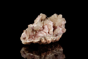 Macro mineral stone Pink Amethyst on a black background