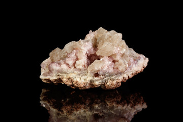 Macro mineral stone Pink Amethyst on a black background