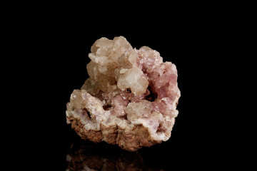 Macro mineral stone Pink Amethyst on a black background