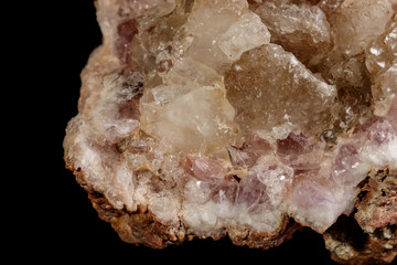 Macro mineral stone Pink Amethyst on a black background