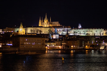 Fototapeta na wymiar Prague, Czech Republic, Europe,Night panorama overlooking the historic buildings of Prague Castle, Charles Bridge and the Vltava River