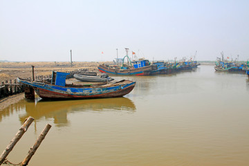 Fototapeta na wymiar Wooden fishing boats on the shore