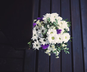 Fototapeta na wymiar Creative bouquet with flowers. Spring minimal concept. 