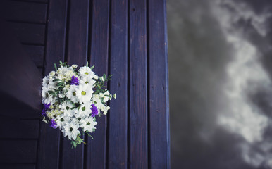 beautiful modern wedding bouquet on wooden background