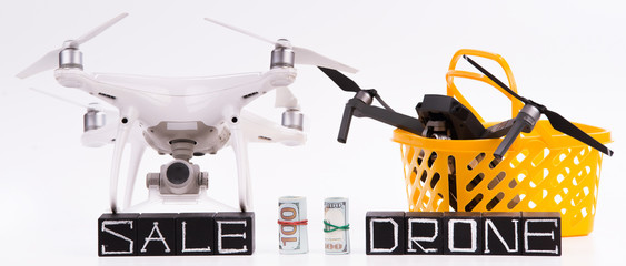 Flying drones on a white background with inscriptions "sale drone"