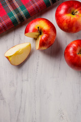 apples on white wooden background