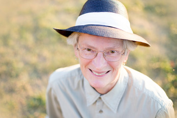Old woman wearing a hat