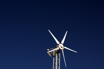 wind turbine against blue sky