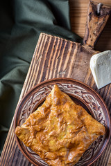 Traditional Georgian bread - khachapuri and Kolkh khachapuri on the table.