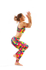 beautiful flexible woman doing yoga poses on white