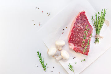 Fresh beef fillet with ingredients in cooking