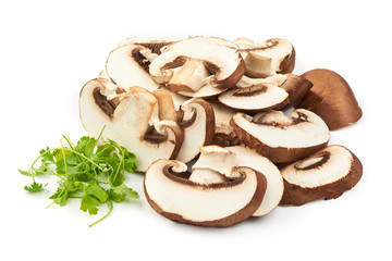 Fresh Brown Champignon Mushrooms slices with Parsley, close-up, isolated on white background