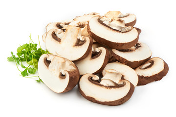 Sliced Champignon Mushrooms with parsley, close-up, isolated on white background