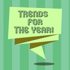 Fototapeta premium Handwriting text Trends For The Year. Concept meaning Modern trendy styles new designs fashion industry Folded 3D Ribbon Strip Solid Color Blank Sash photo for Celebration