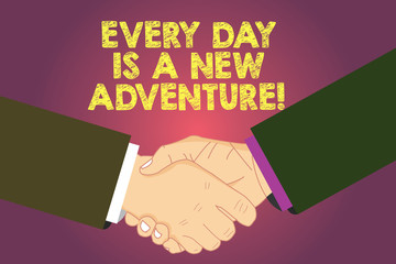 Word writing text Every Day Is A New Adventure. Business concept for Start your days with positivism Motivation Hu analysis Shaking Hands on Agreement Greeting Gesture Sign of Respect photo