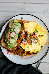 Hash with Eggs and Avocado Toast