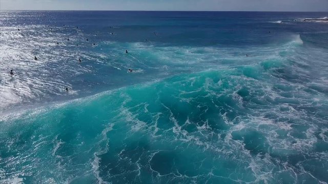 Aerial view of the ocean wave breking on the shore. Makaha Beach Park, West Shore of Oahu, Hawaii