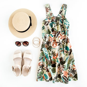 Woman summer clothes travel, collage on white background. Sundress-dress, straw hat, sunglasses. Top view, flat lay.