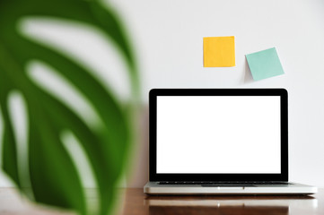 Stylish desk with laptop mock up. Minimal workspace desk of designer.	