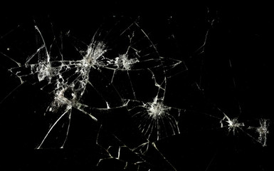 Glass with cracks and a hole from firearms - obrazy, fototapety, plakaty