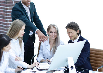 Fototapeta premium business team discussing business issues in a modern office