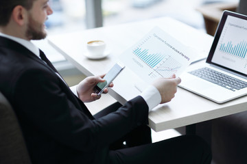 Close-up of manager working with financial documents