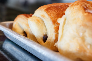 Closeup of three pastries on tray