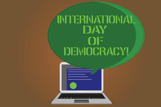 Writing note showing International Day Of Democracy. Business photo showcasing Celebrating voting rights around the world Certificate Layout on Laptop Screen and Halftone Speech Bubble