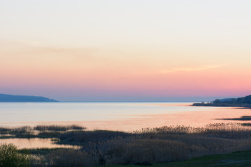 Sunset over the river in the spring
