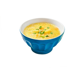 Cheese soup with chicken, potatoes and turmeric isolated with clipping path