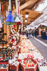 Kiosk with Christmas decorations made in Hungary in the beautiful Christmas Market at St. Stephen's Square in front of the St. Stephen's Basilica in Budapest