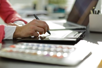 close up.fashion designer working on graphics tablet