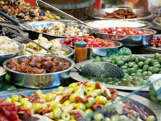 Close up of several baskets of Tarallucci with spices, like Saffron. Savory biscuits typical of southern Italy. Horizontal view