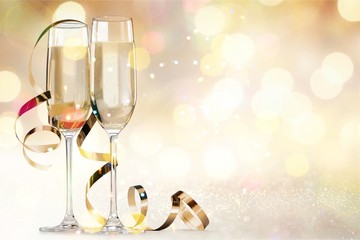 Two glasses of champagne isolated on white background